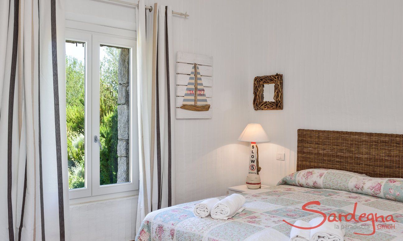Li Conchi 4 | Bedroom 1 with double sized bed Bedroom