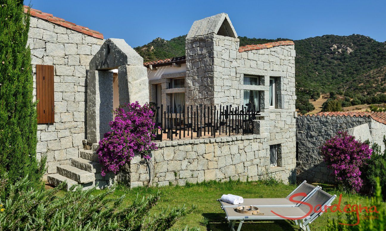 Li Conchi 5 | View from the garden to the house Holiday home Li Conchi 5 with garden and terrace