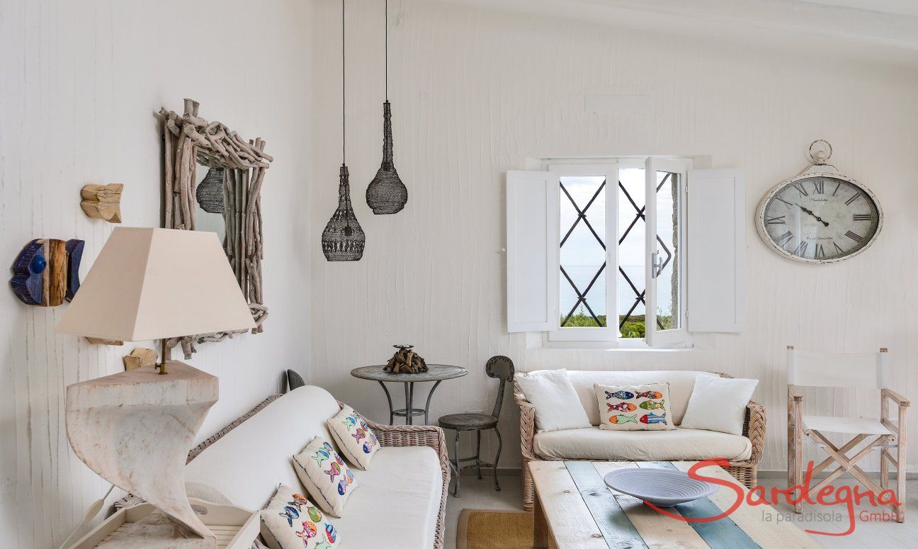 Living room with sofa corner and sardinian decoration 