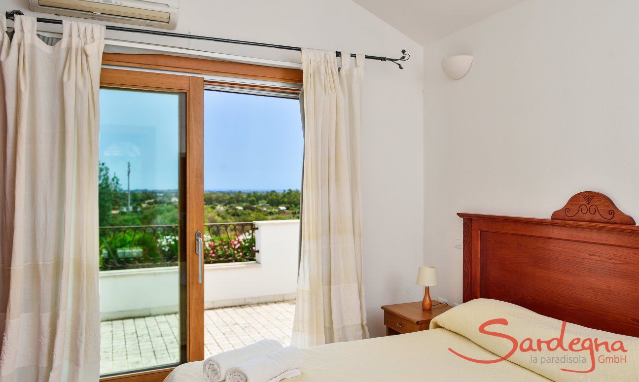 Villa del Campo | Bedroom 1 on the first floor with a double sized bed and terrace access Bedroom first floor with a double sized bed and terrace access