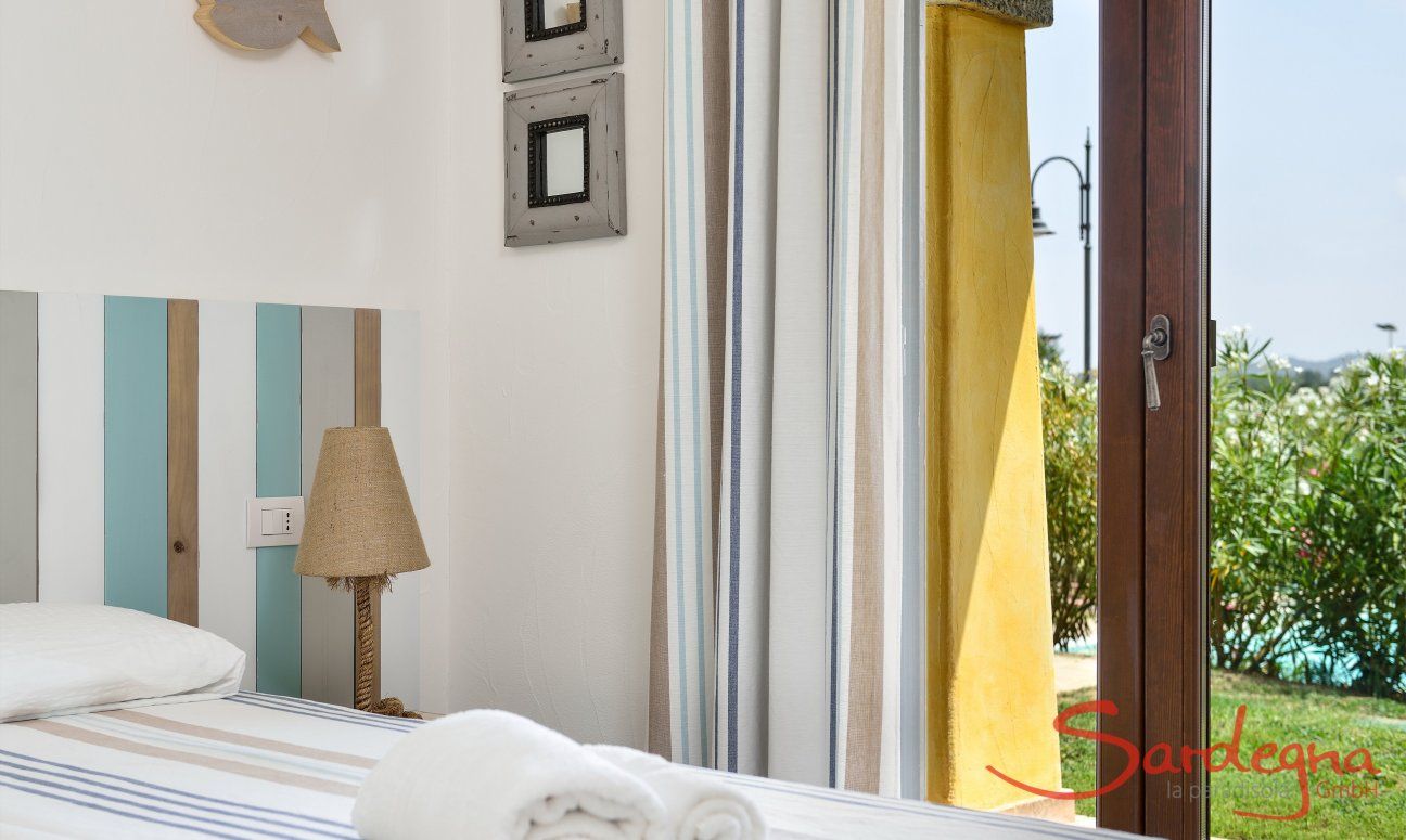 Villa Campidano 8 | Bedroom 2 with garden access as well Bedroom and garden