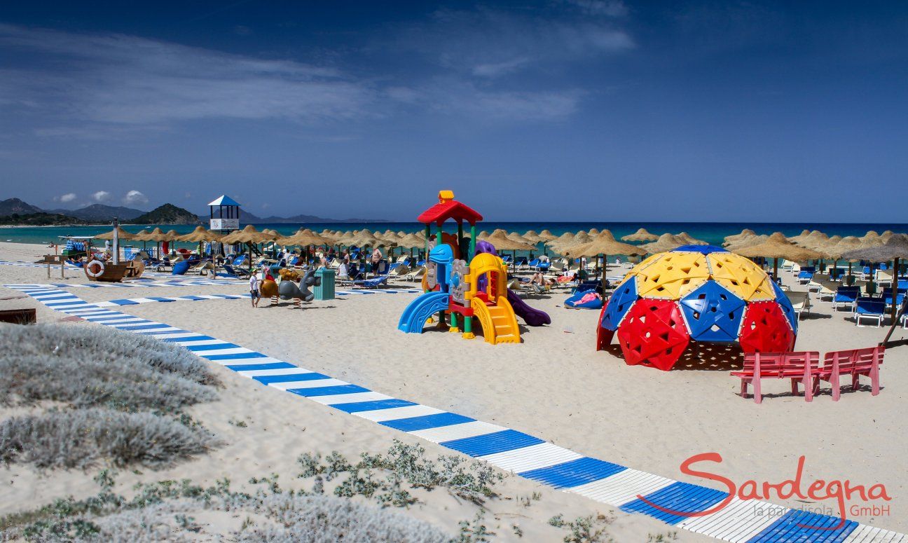 Children's playground on the lido of Tamatete on the beach of Cala Sinzias