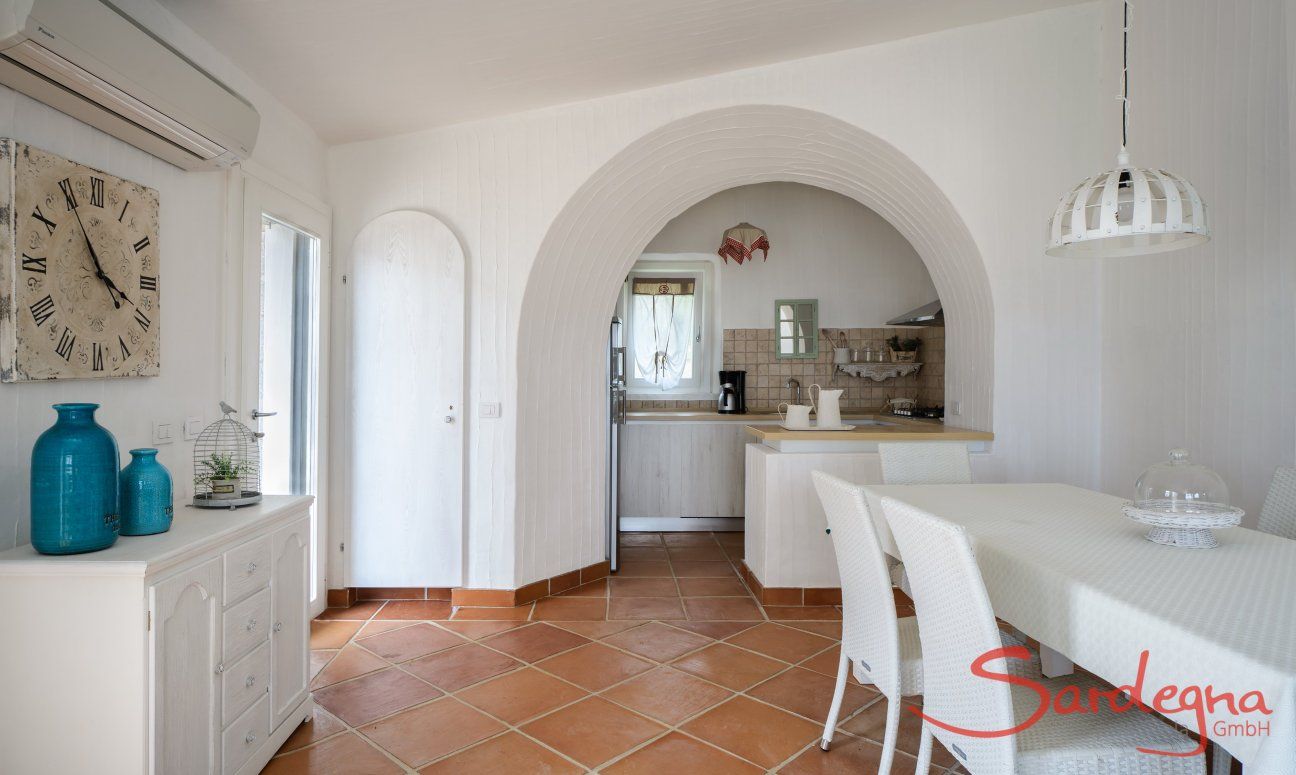 Li Conchi 27 | Dining area with kitchen in the background Dining area with kitchen in the background