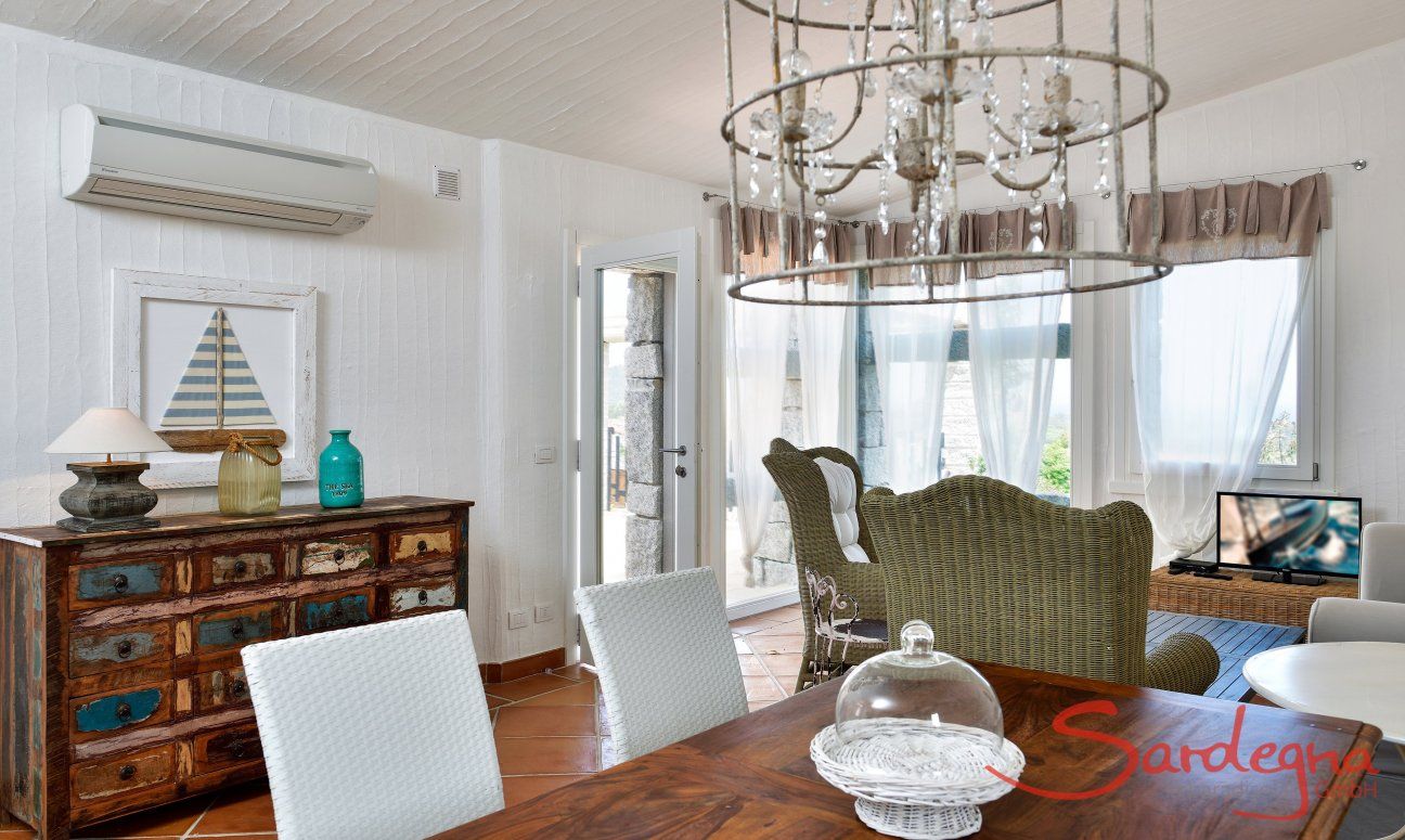 Li Conchi 32 | Bright living room with large panoramic windows Sardinia