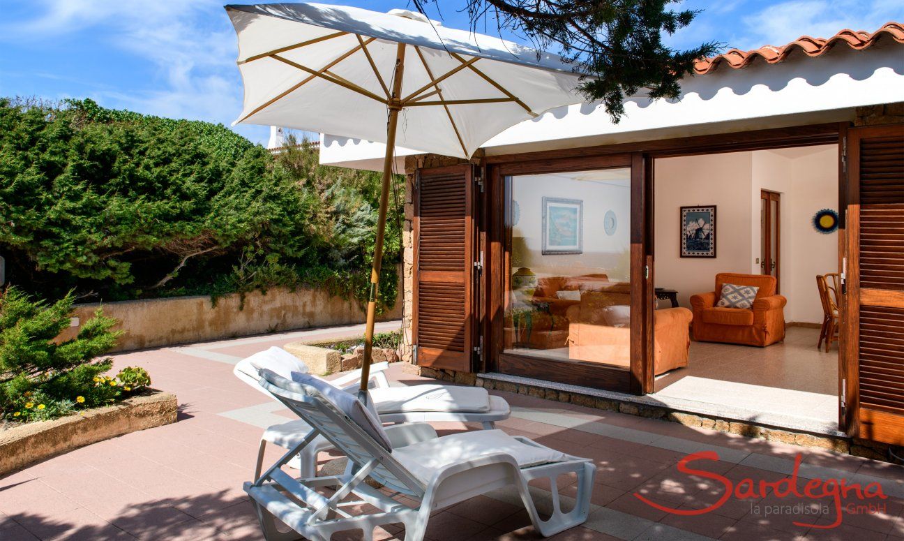 Villa Massimo | Terrace with a glas sliding door to the living area Terrace with a glas sliding door to the living area