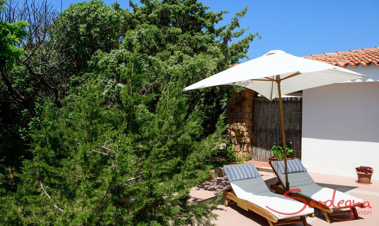 Villa Marco | Relaxing on the terrace on sunbeds Relaxing on the terrace on sunbeds