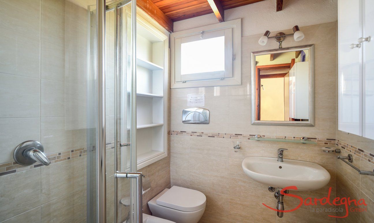Bathroom with shower and bidet