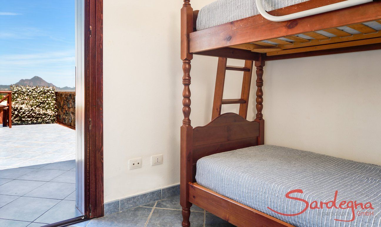 Apartment Castededdu 5 | Bedroom 2 with bunk bed and terrace access Bedroom 2 with bunk bed and terrace access