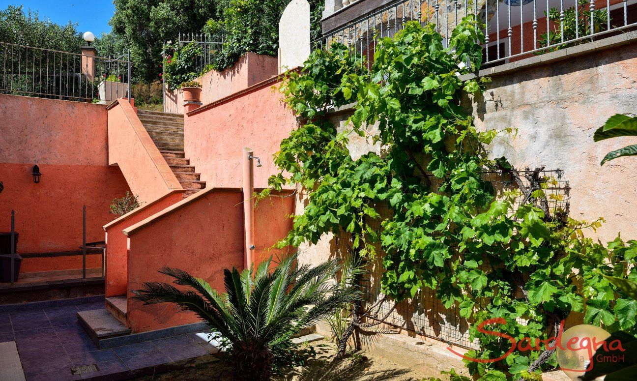 Apartment Castededdu 7 | Garden and outdoor shower in the yard Outdoor shower in the yard