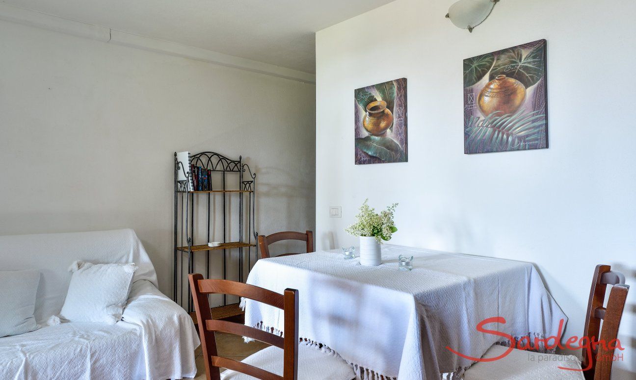 Apartment Castededdu 10 | Living area with dining table and sofa corner Living area with dining table and sofa corner