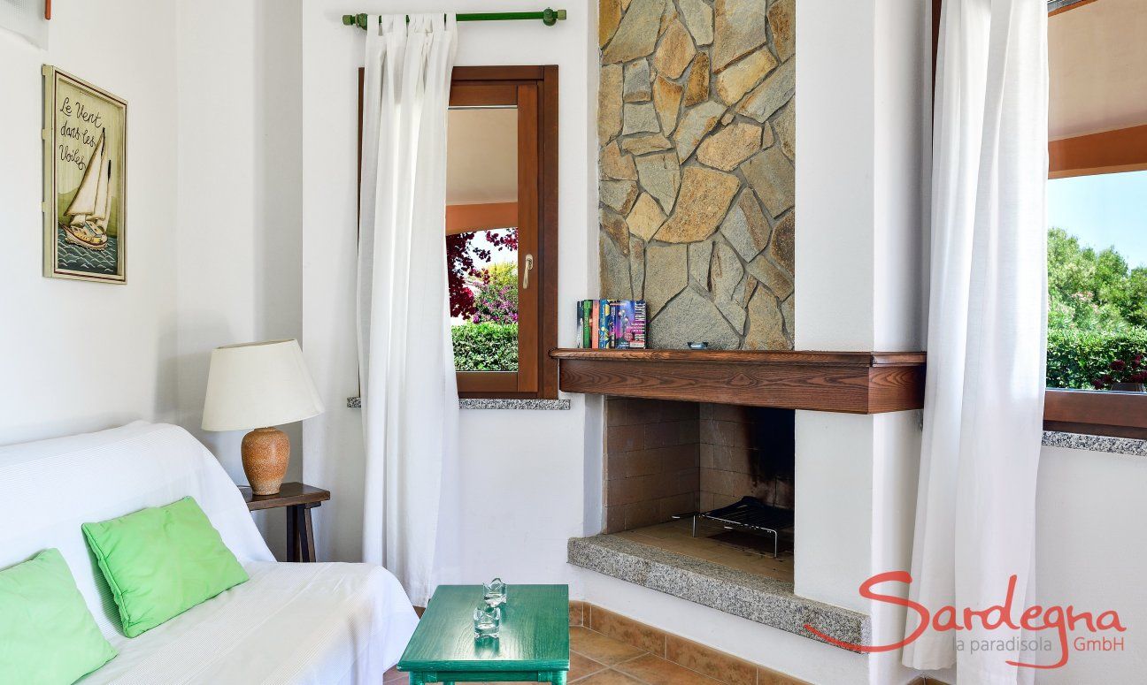 Villa Daniele | Fireplace Fireplace inside opposite the sofa