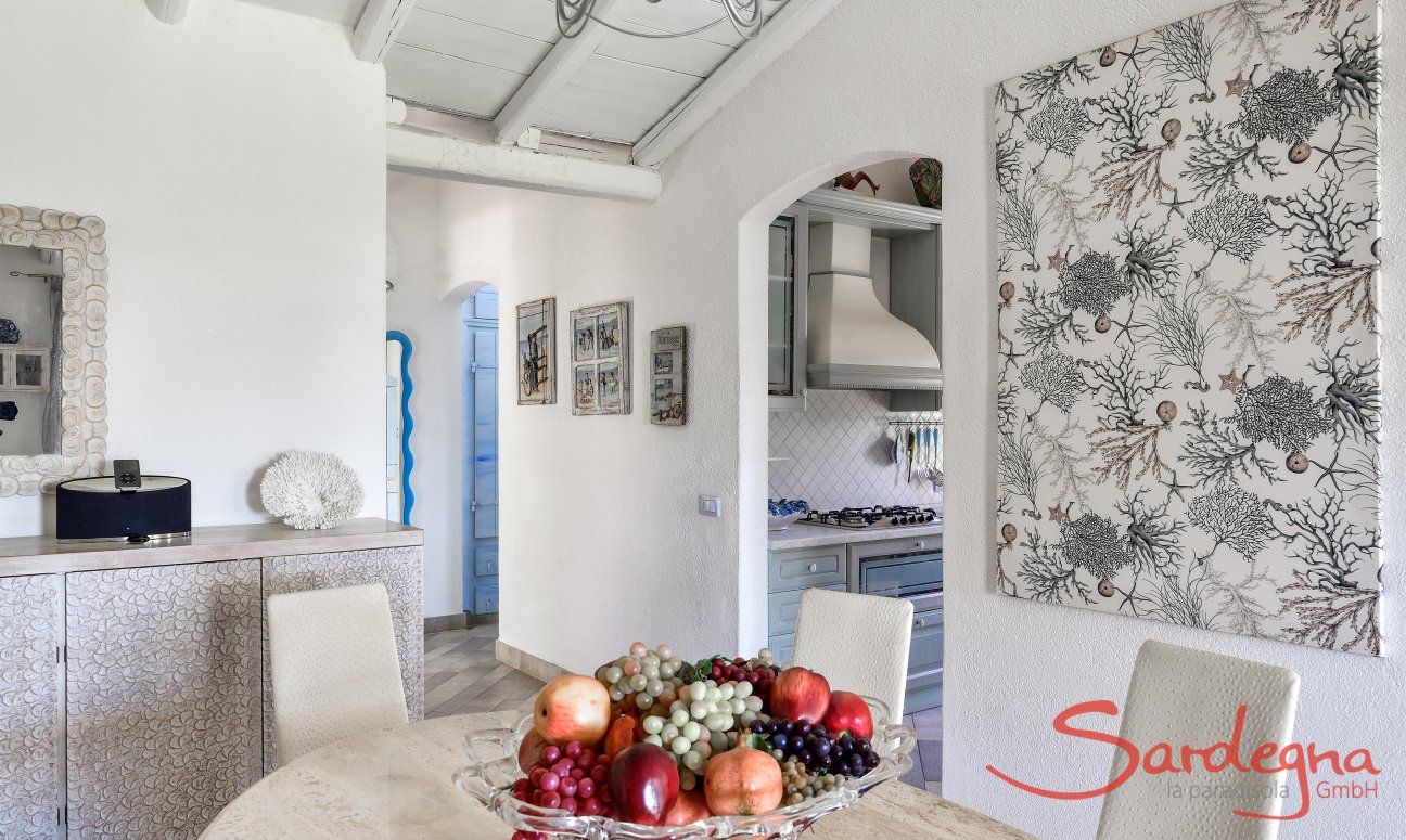 Dining area with view to the kitchen and bedrooms