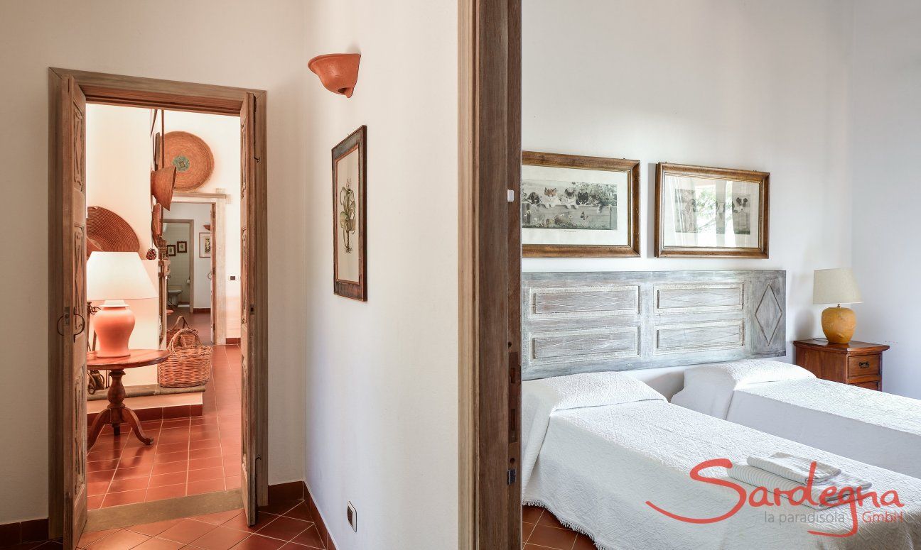 Corridor and a view into the first bedroom 