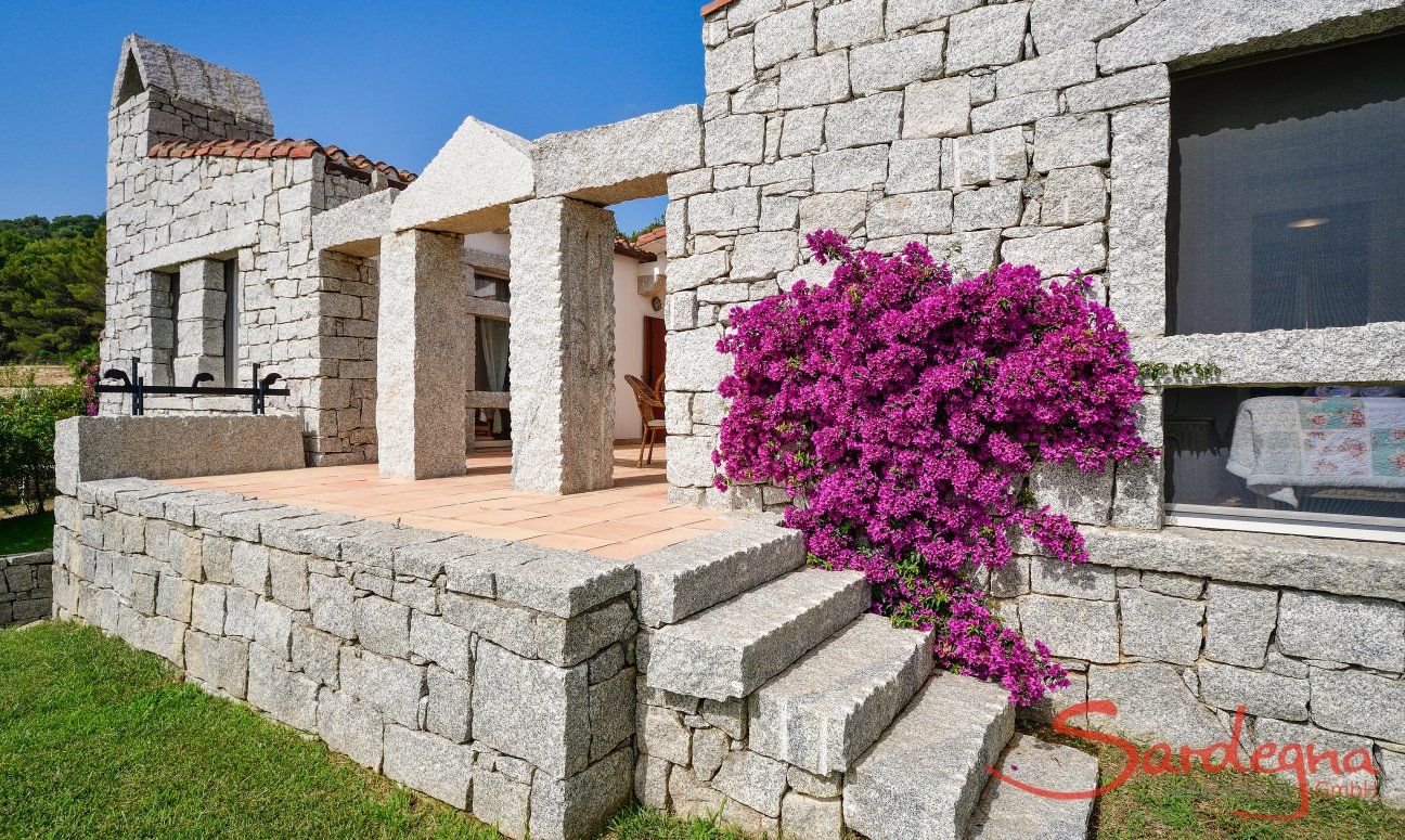 Li Conchi 35 | Granite stairs lead from the garden to the house Stairs to the house