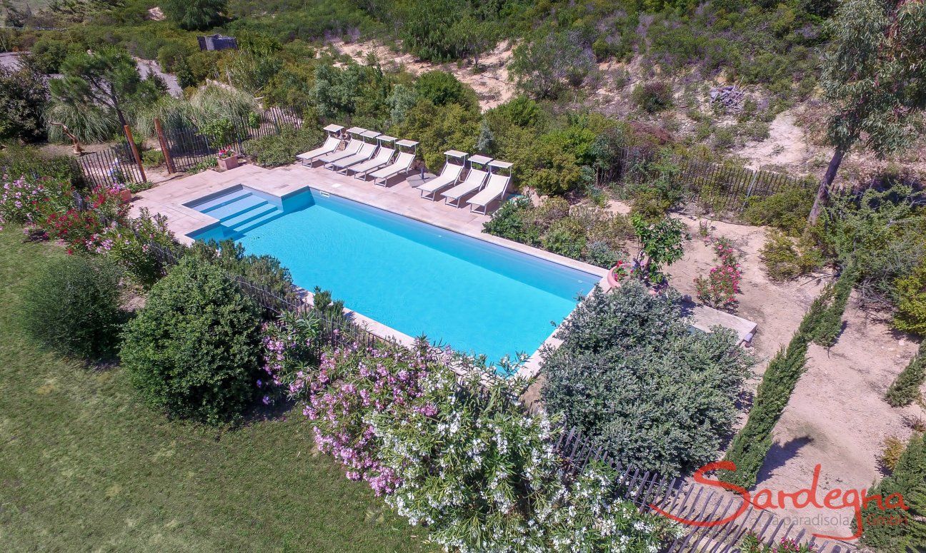 Villa Isabelle | Aerial view of the pool area with Mediterranean plants Aerial view of the pool area with Mediterranean plants