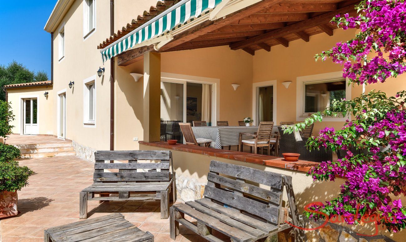 Villa Caroline | Big and roofed terrace with dining table Big and roofed terrace with dining table