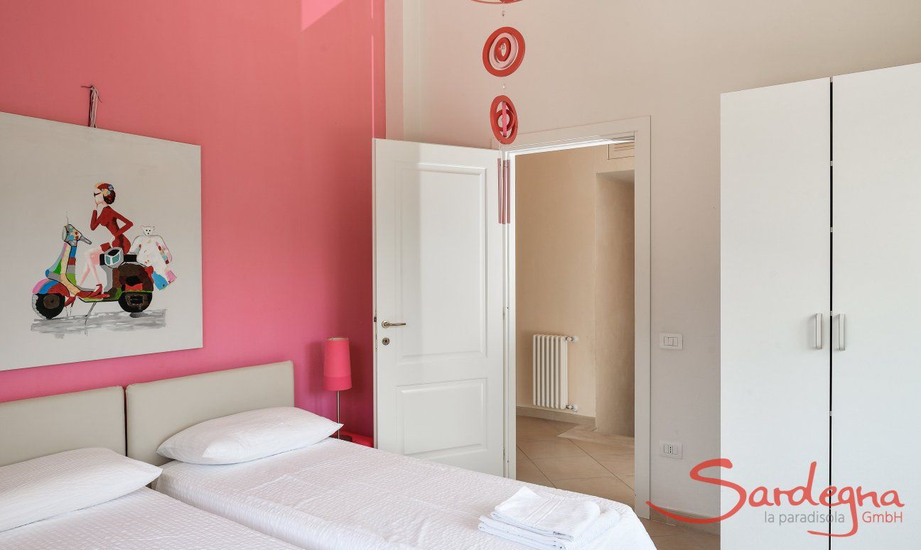 Villa Caroline | Bedroom 2 with double sized bed and storage space Bedroom 2 with double sized bed and storage space