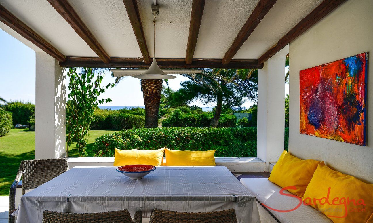 Villetta 3 | Roofed terrace with beautiful garden view Roofed terrace with beautiful garden view