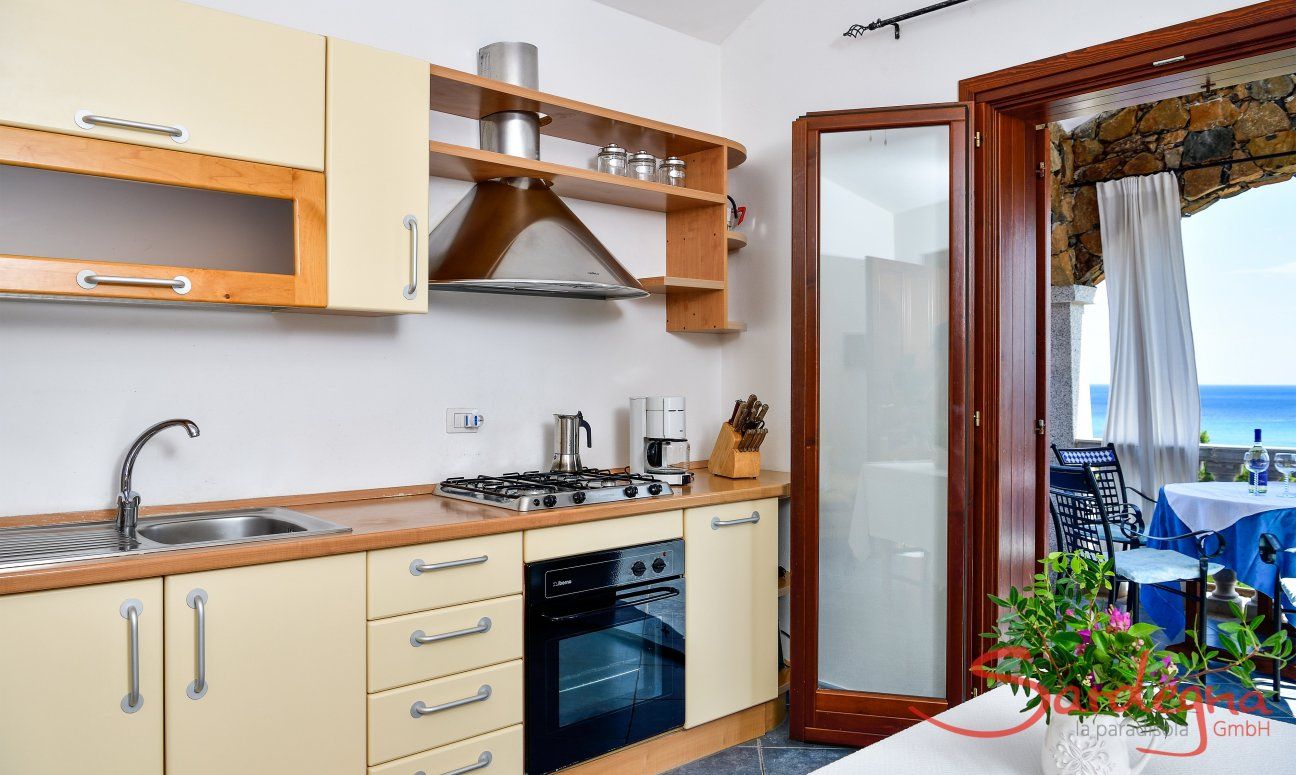 Apartment Castededdu 5 | Fully equipped kitchen with terrace access Fully equipped kitchen with terrace access