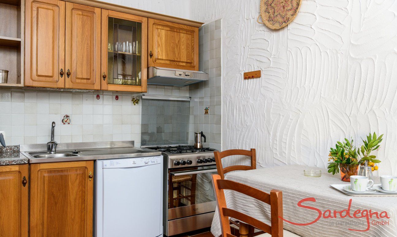 Casa Meloni 1 | Kitchen with all essential devices and breakfast table Kitchen with all essential devices and breakfast bar