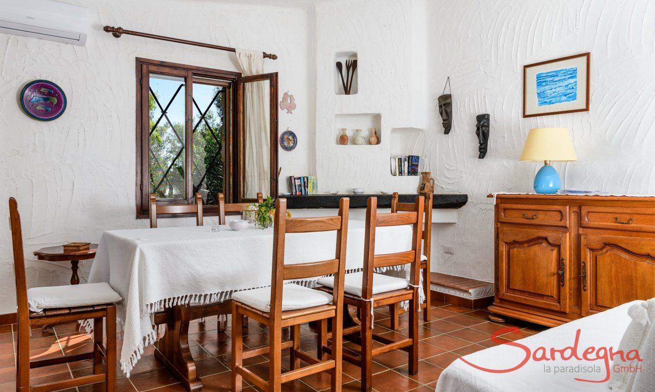 Casa Meloni 2 | Dining table in the living area Living room with dining area Meloni 2 in Sant Elmo