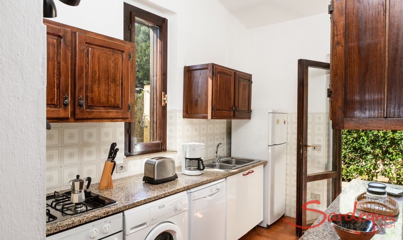 Fully equipped kitchen with garden access