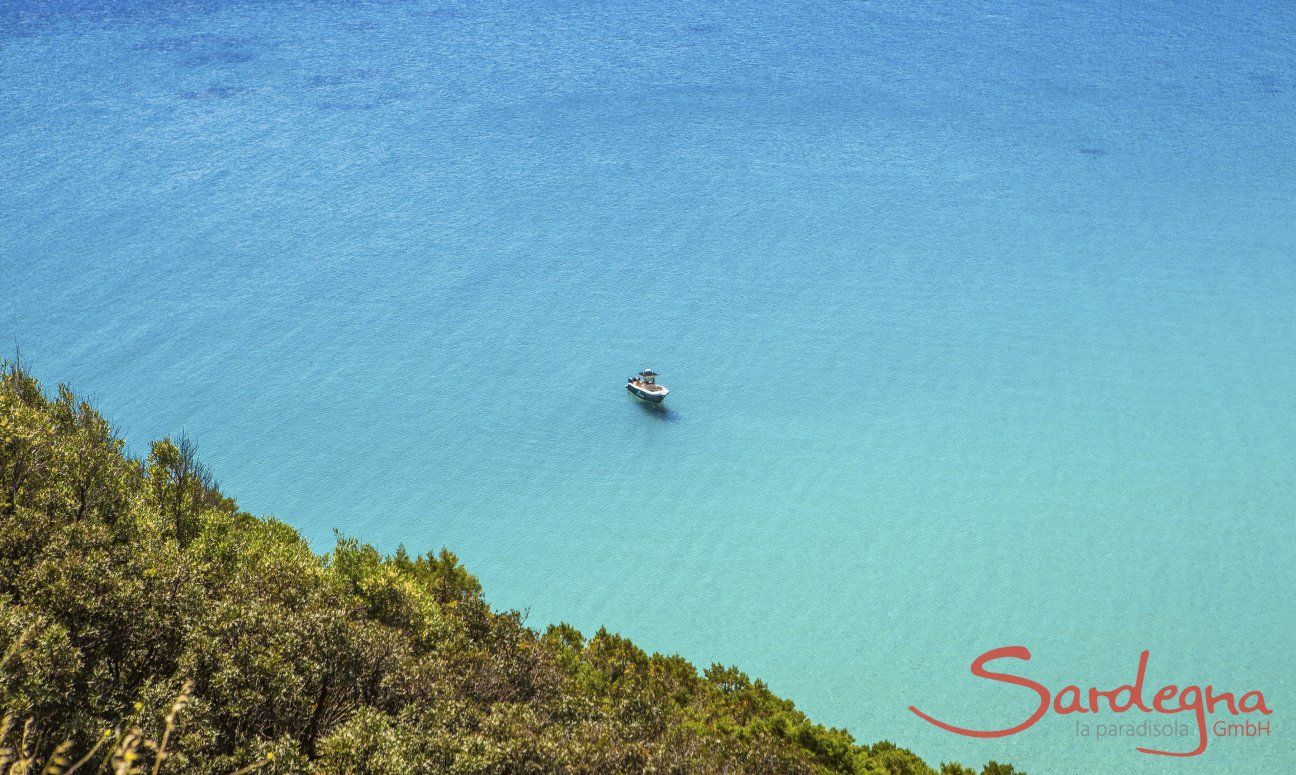 Motorboat Excursions | Crystal clear sea with rubber dingee at Torre delle Stelle Crystal clear sea with rubber dingee, Torre delle Stelle
