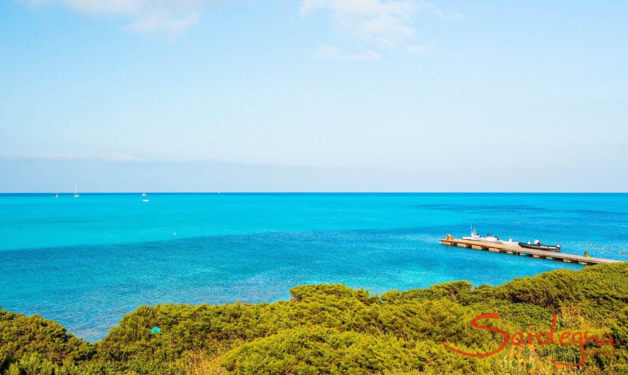 Jetty in the blue sea of La Pelosa, Stintino