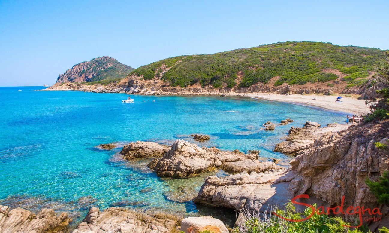 Crystal clear water bathes the rocks of Capo Ferrato