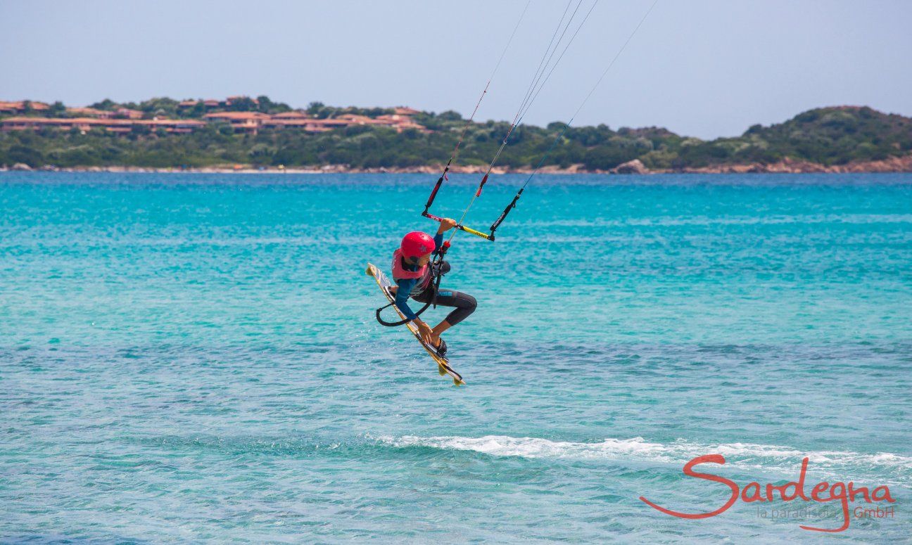 Kitesurfer on the beach La Cinta, San Teodoro, Olbia