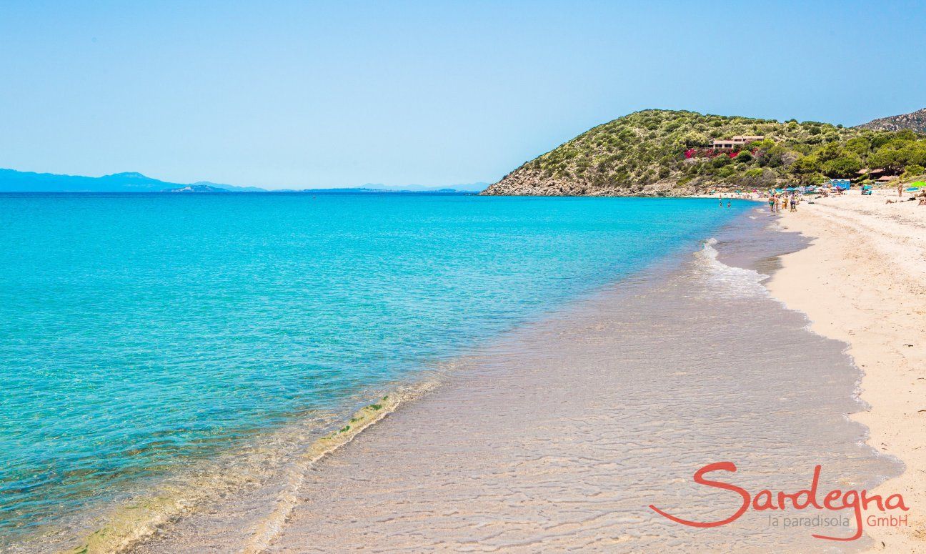 Beach of Geremeas with crystal clear water and Torre delle Stelle in the background