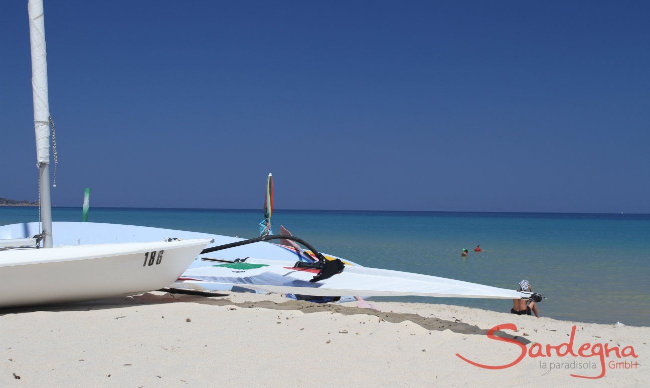 Surf an Laser on the beach of Cala Sinzias