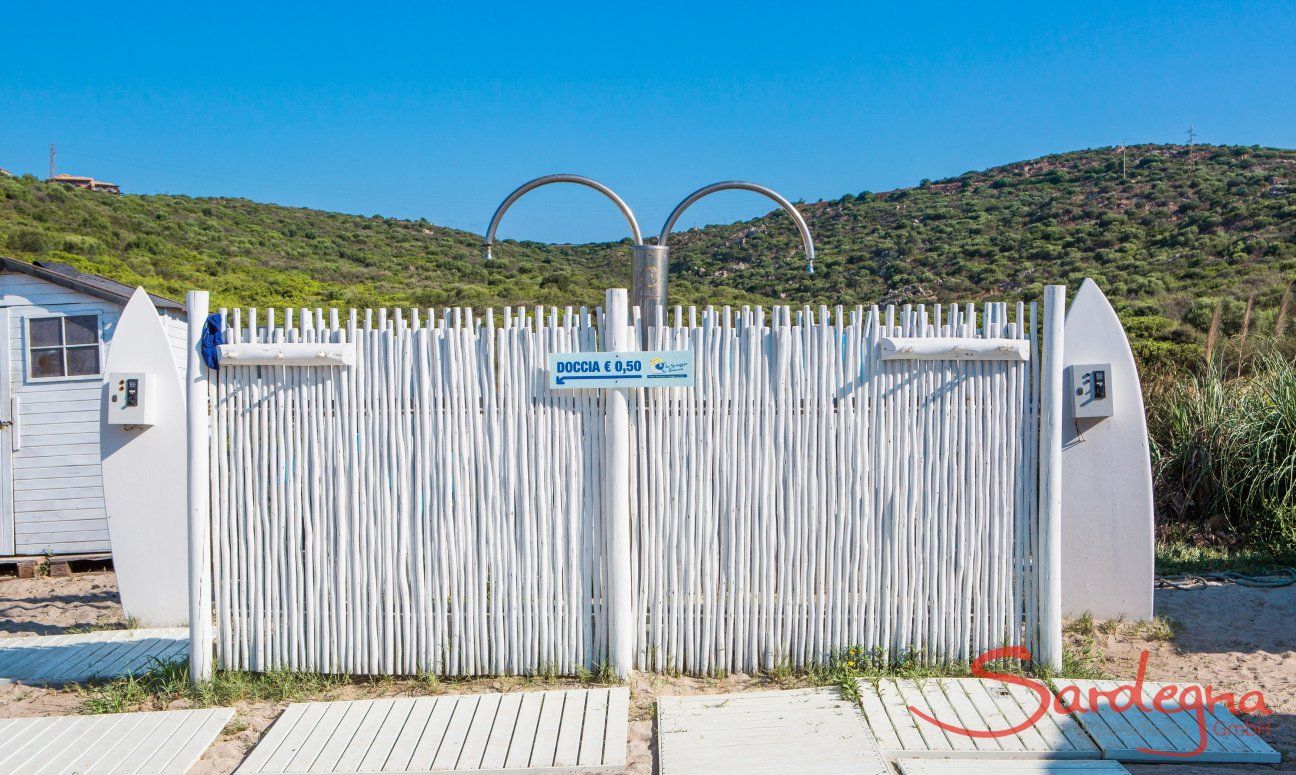 Showers on the beach of Golfo Aranci