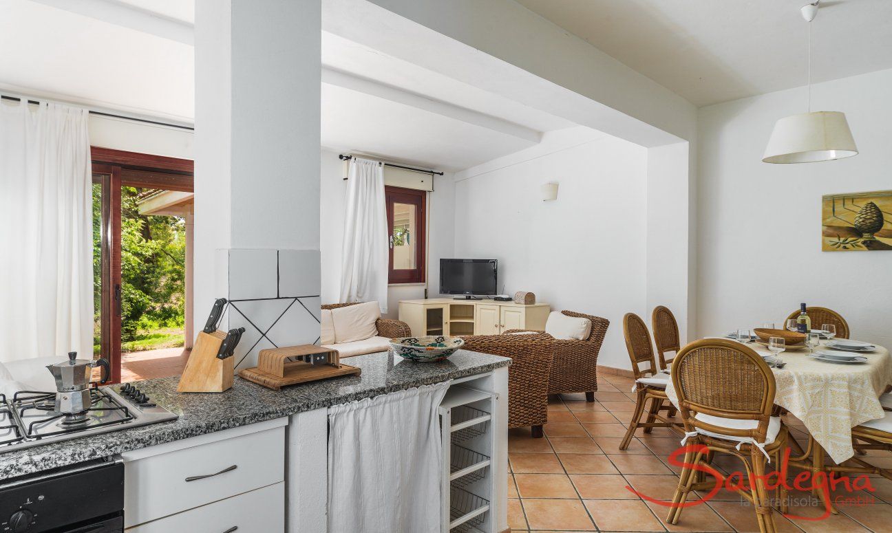 Apartment Orri 1 | Spacious living room with kitchenette, dining area and living area Orri 1 Tortoli, East Sardinia