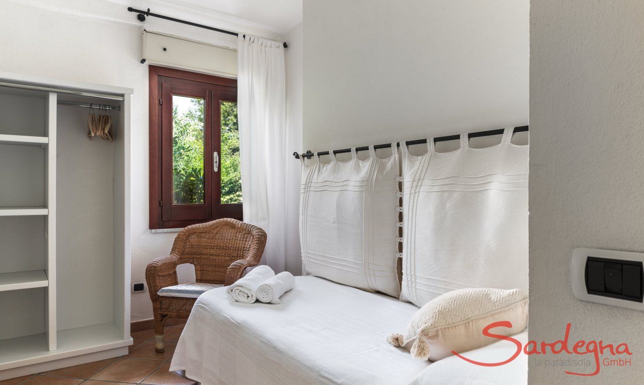 Apartment Orri 1 | Bedroom 3 with single bed and garden view Orri 1 Tortoli, East Sardinia
