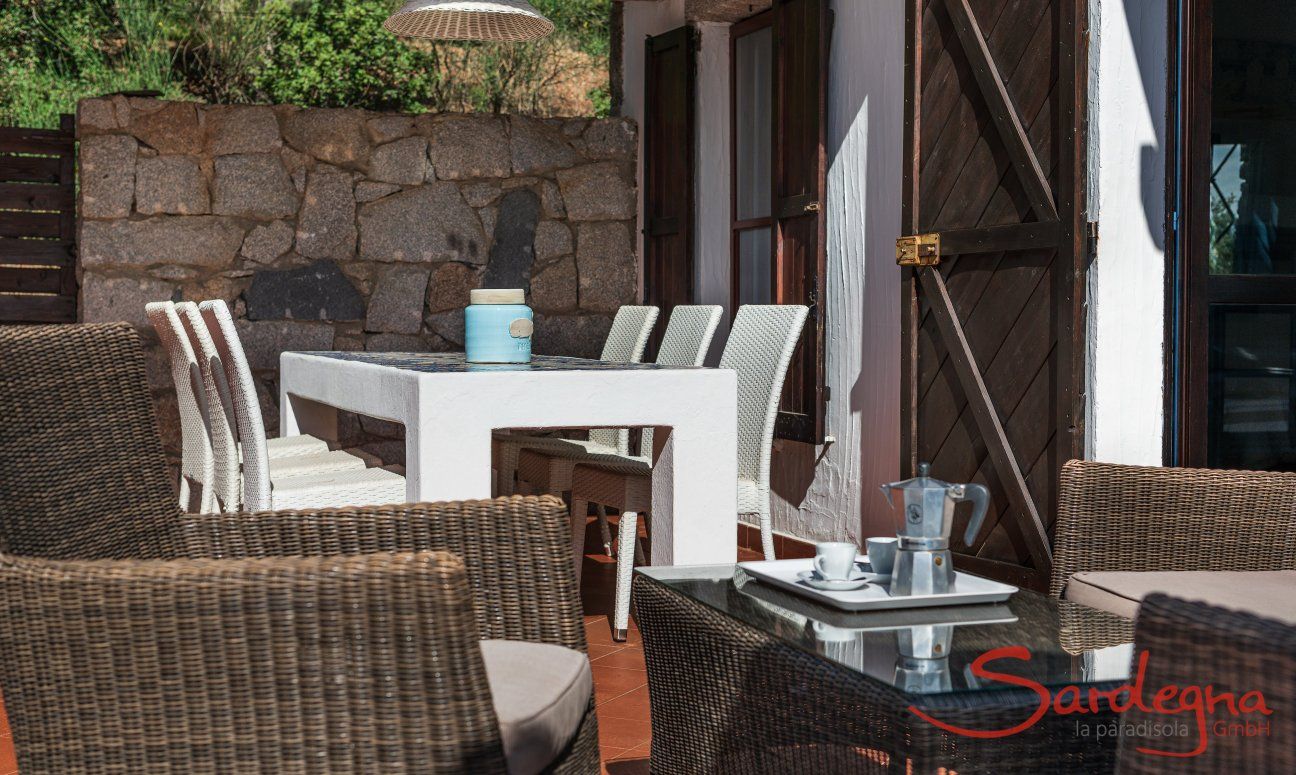 Casa 17 | Terrace with comfortable lounge furniture and dining table Casa 17, Sant Elmo, South Sardinia