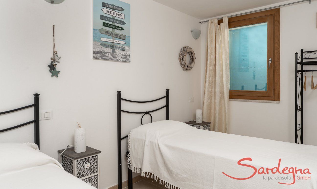 Villa del Campo | Bedroom 5 with two single beds on the basement floor Villa del Campo, Is Molas, Pula