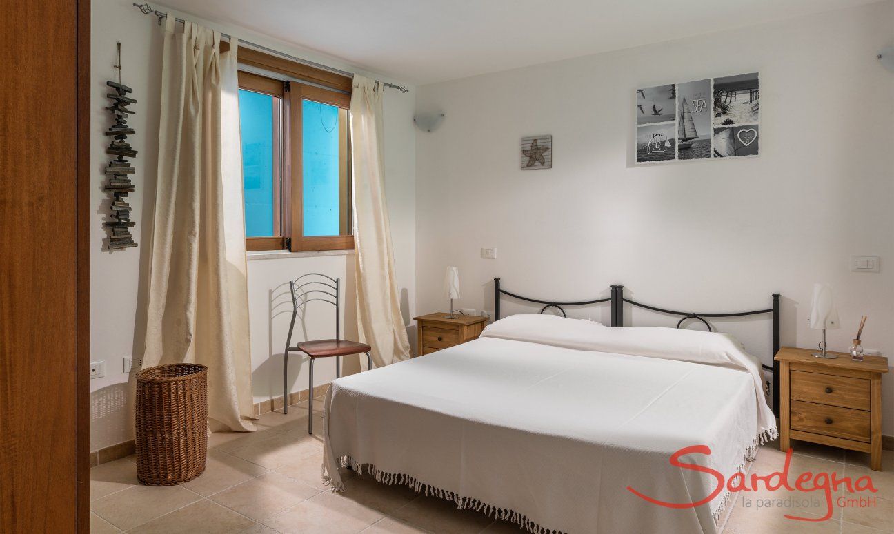 Villa del Campo | Bedroom 4 with double sized bed on the basement floor Villa del Campo, Is Molas, Pula