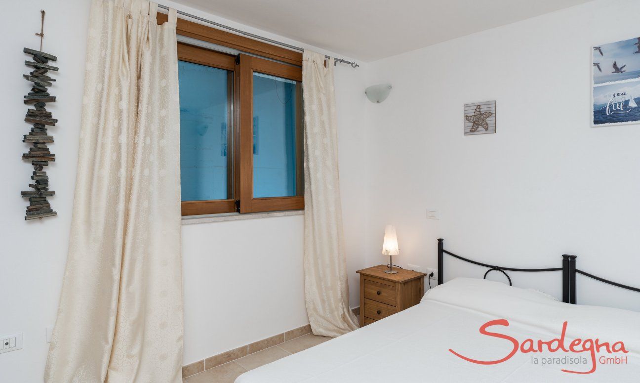 Villa del Campo | Bedroom 4 with double sized bed on the basement floor Villa del Campo, Is Molas, Pula