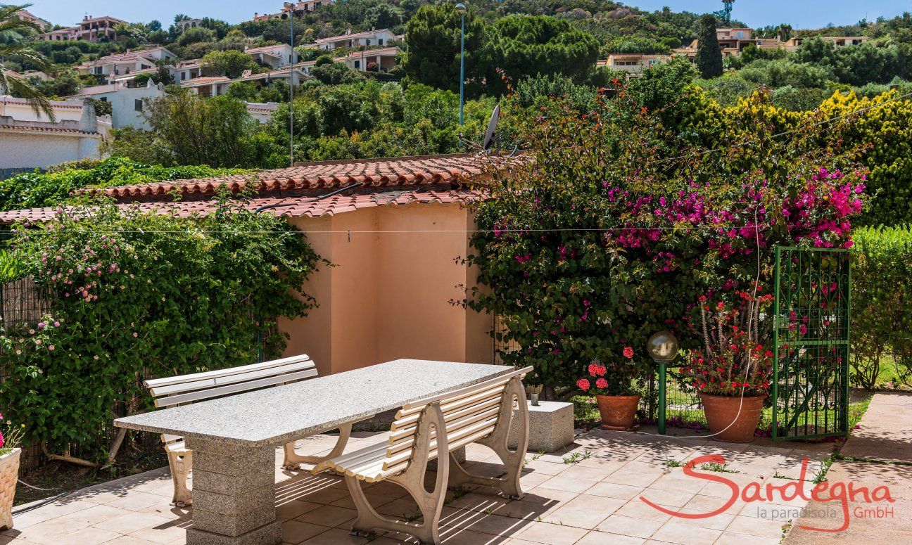Villa Palme | Big, granite table with view on the hill of Costa Rei Villa Palme, Costa Rei