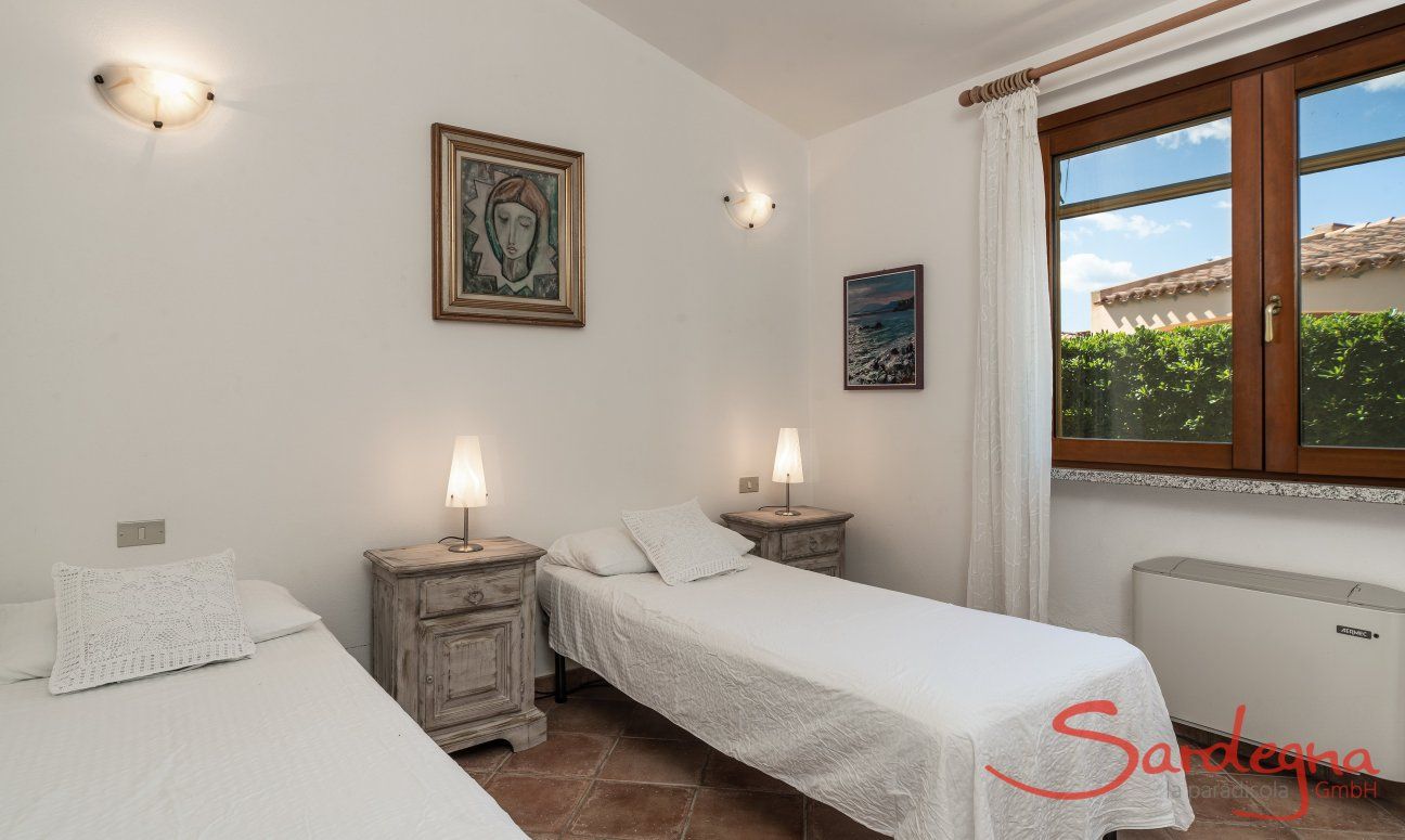 Villa Tiziana 11 | Bedroom 2 with two single beds that can be put together Portrait of the house