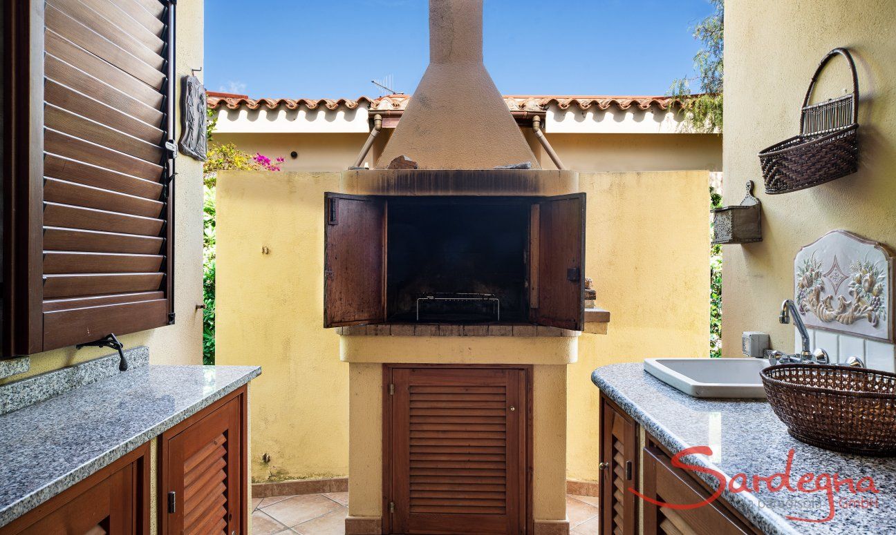 Villa Tiziana 11 | In the brick-built barbecue right beside the house and a handy working place and sink invites to try out your grilling skills Portrait of the house