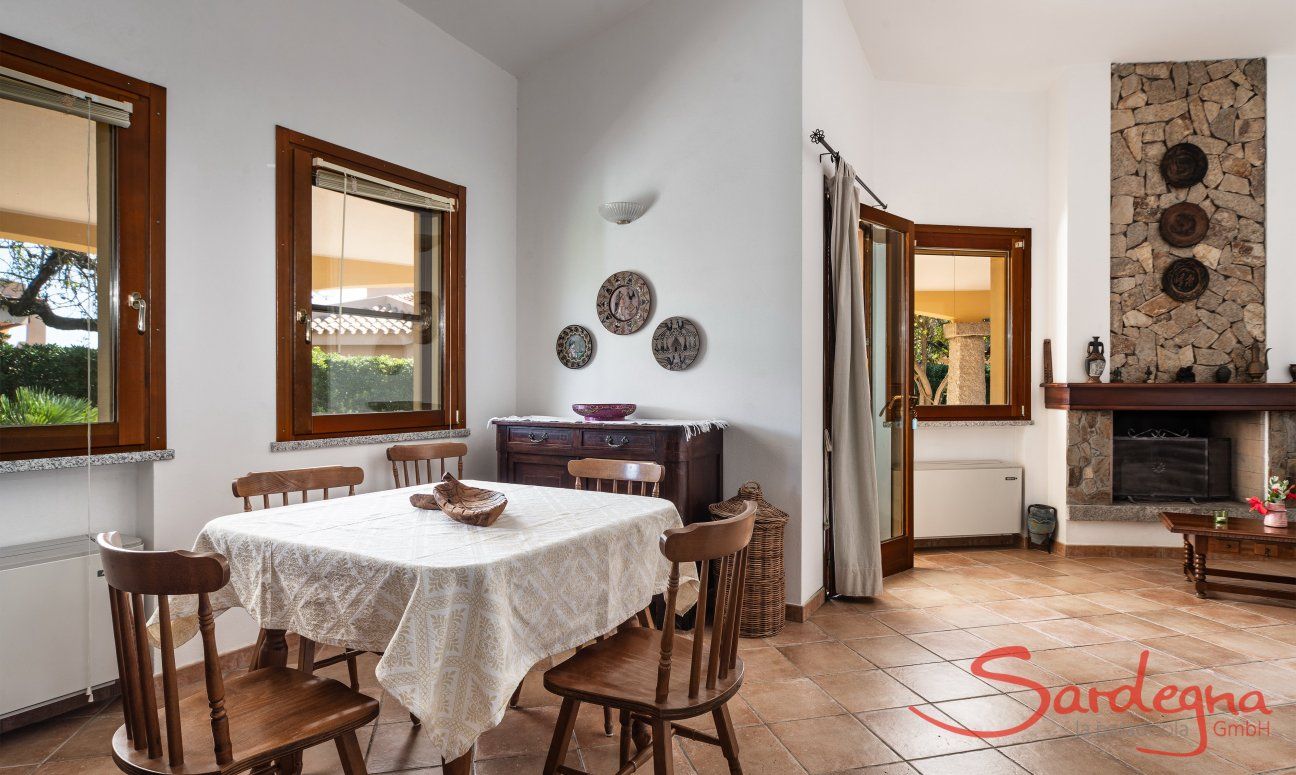 Villa Tiziana 11 | Spacious dining area with rustic dining table Portrait of the house