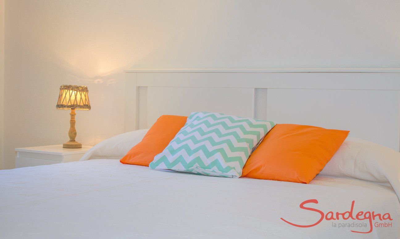 Villetta Fabio | Bedroom detail with double bed Villetta Fabio, Costa Rei