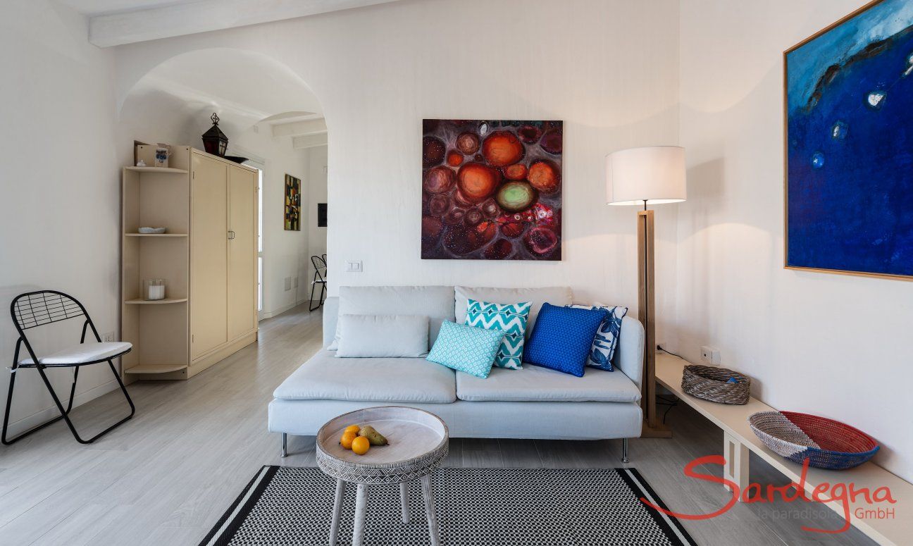 Casa 1 | An open corridor leads from the living room to the kitchen Livingroom Casa 1 Sant'Elmo