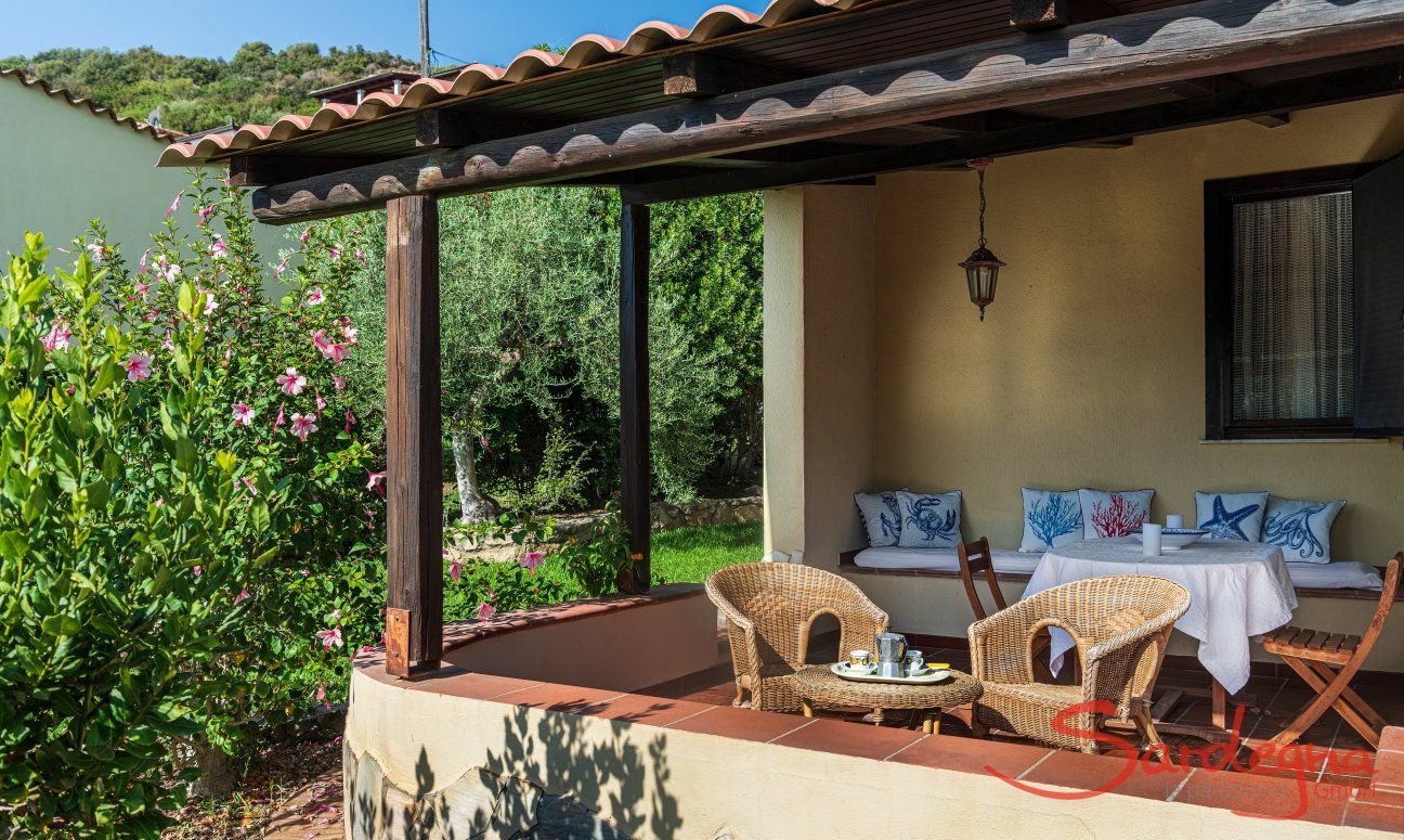 Villa Lucia | Covered terrace with sofas, where you can enjoy breakfast overlooking the garden New Picture 2022