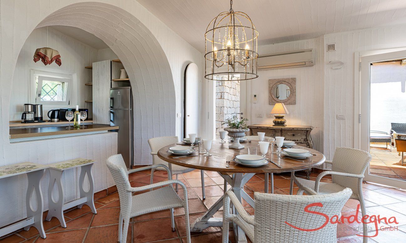 Li Conchi 33 | Dining table and kitchen with view onto the terrace New Picture 2025