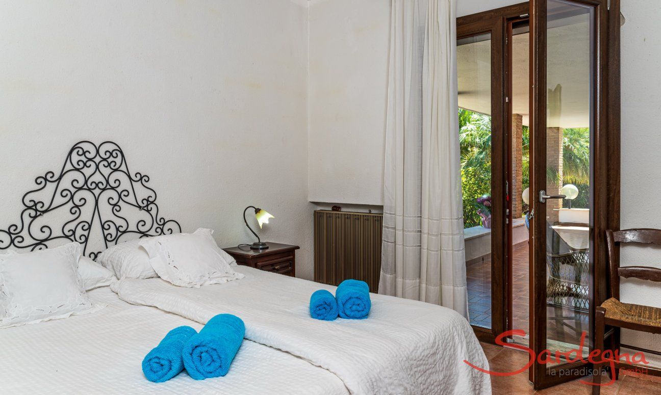 Villa Palme | Bedroom 2 with exit to the terrace New Picture