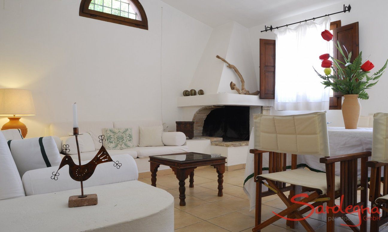 Villa Fiori 4 | Living room with a sofa and dining table Living room with a sofa and dining table
