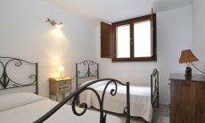Apartment Castededdu 3 | Bedroom 2 with two single beds Bedroom 2 with two single beds